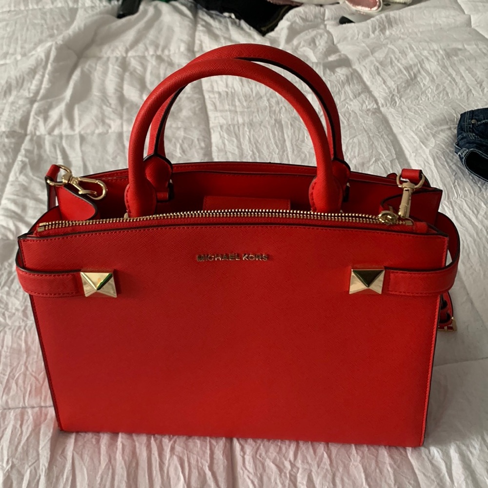 Red Michael Kors bag with gold hardware